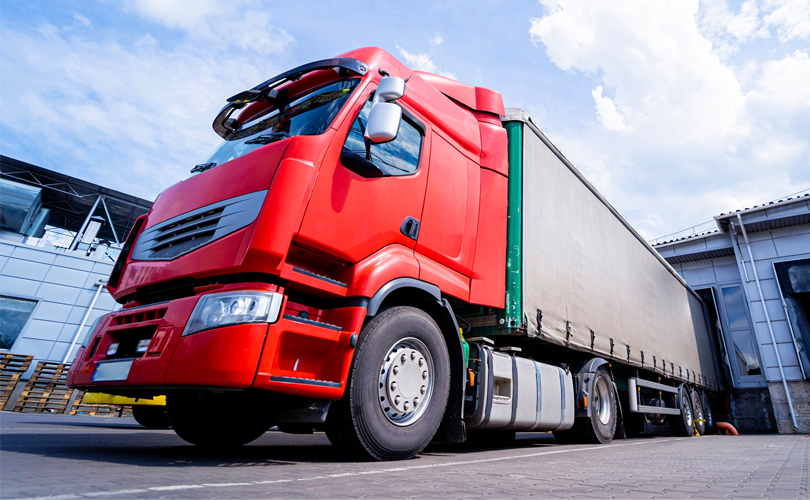 Logistics truck moving cargo on highway